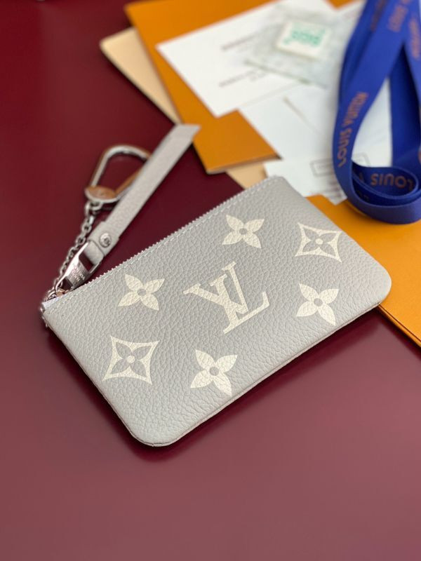 l0vis Vvtt0n key pouch bicolor monogram empreinte leather